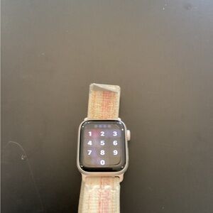 Apple Watch with Pink and Beige Woven Sport Loop Band